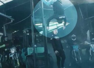 Poliziotto appeso a testa in giù nel video choc del rapper “Fuma”: rimosso da “YouTube” dopo le polemiche